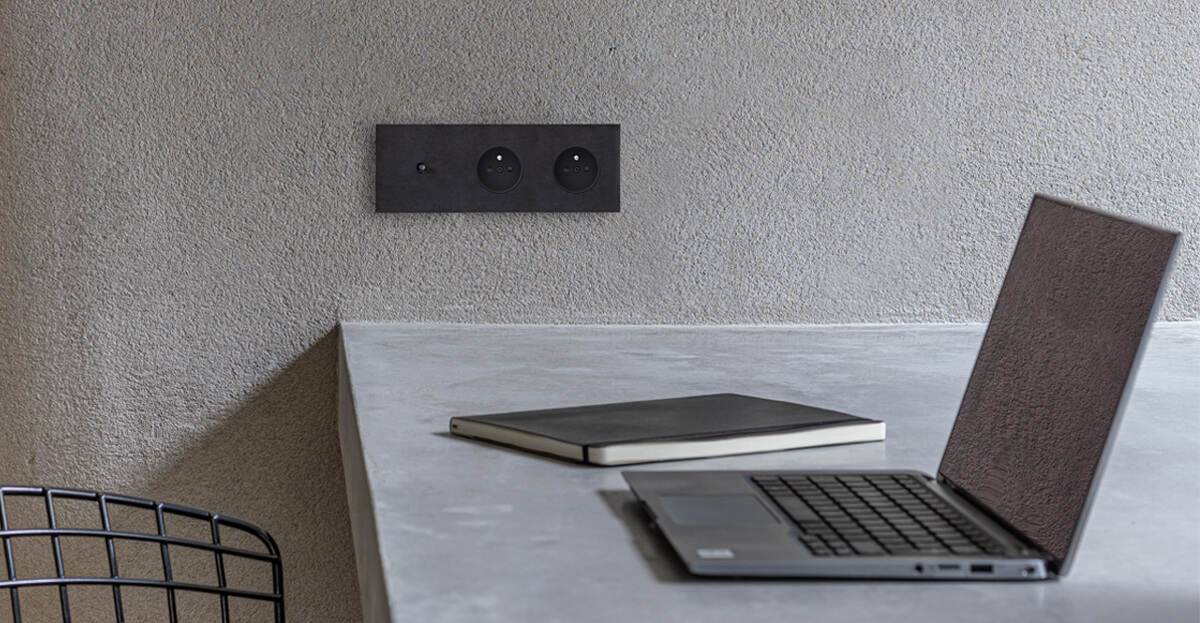 black design double  socket combined with Niko Toggle light control switch